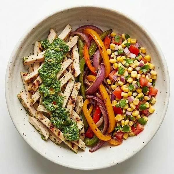 Chicken trinichurri with fajita vegetable & corn salsa